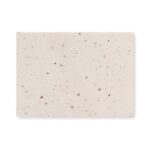 Bloc de notas papel de hierba y tapas de semillas