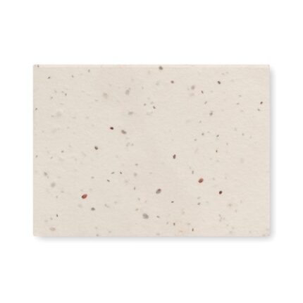 Bloc de notas papel de hierba y tapas de semillas